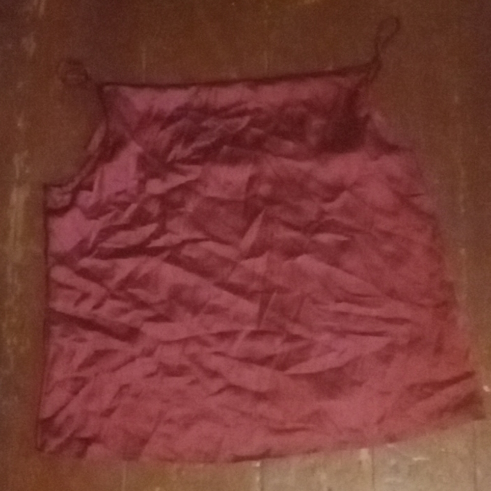 A red spaghetti strap shirt